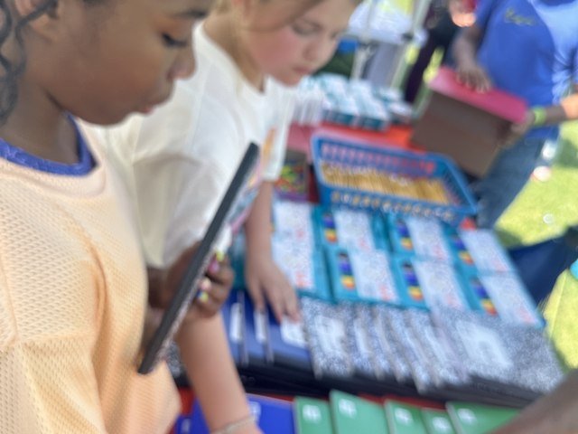Students picking supplies