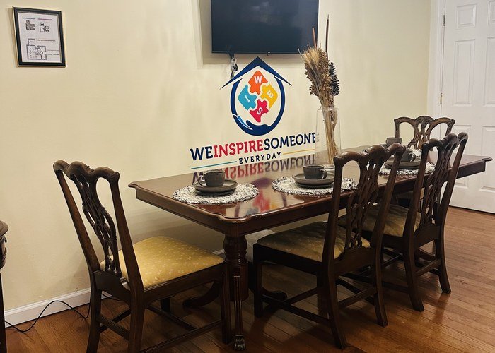 Dining room with table set for meals